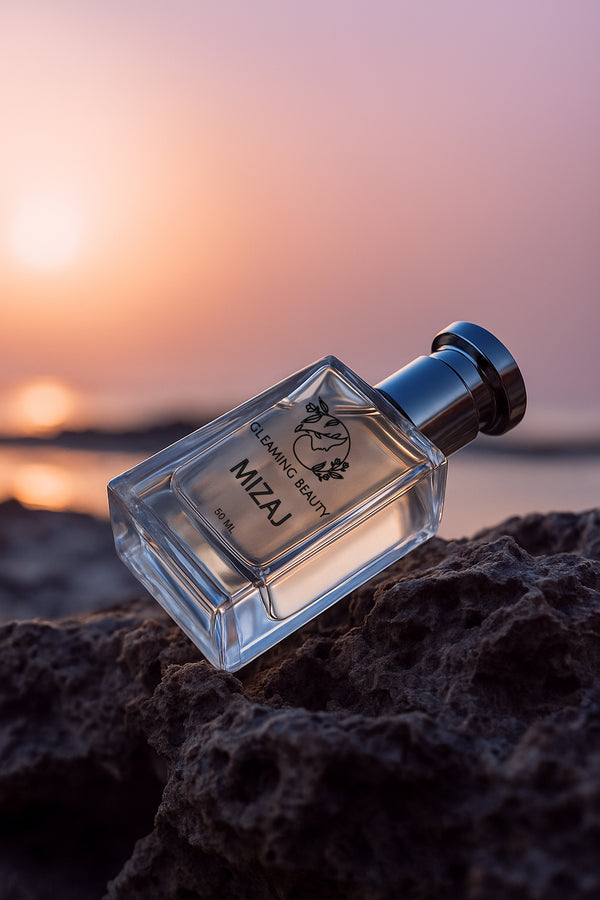 Gleaming Beauty Bloom 50 ml perfume bottle at sunset on rock, floral fruity women’s scent, long lasting perfume in Pakistan.